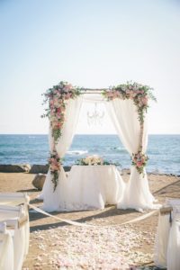 Detailed photo of the wedding arch by Orange County Beach Weddings at the Ocean Institute in Dana Point