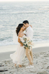 Bride and groom elopement on the beach in Laguna Beach