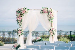 Blush and cream wedding arch flowers
